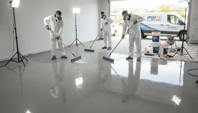 Epoxy floor coating in Chattanooga TN garage with durable, glossy finish by local painting professionals