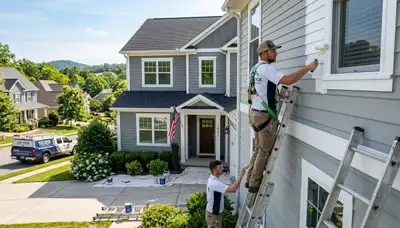 Professional house painters improving home exterior in Chattanooga, TN