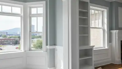 Professional interior trim painting with crisp lines in a Chattanooga, TN home by expert house painters